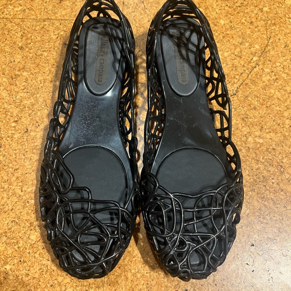Melissa Black Flats with Sleek Design and Comfort